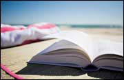beach reading (© iChuck/iStockphoto)