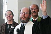 Sue Sinnamon, the Rev. Chris Buice, and UUA President William G. Sinkford