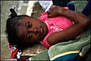 Injured girl in Port-au-Prince, Haiti (AP Photo/Ricardo Arduengo)